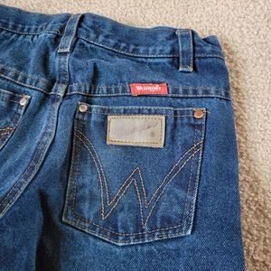 Wrangler  dark blue denim.